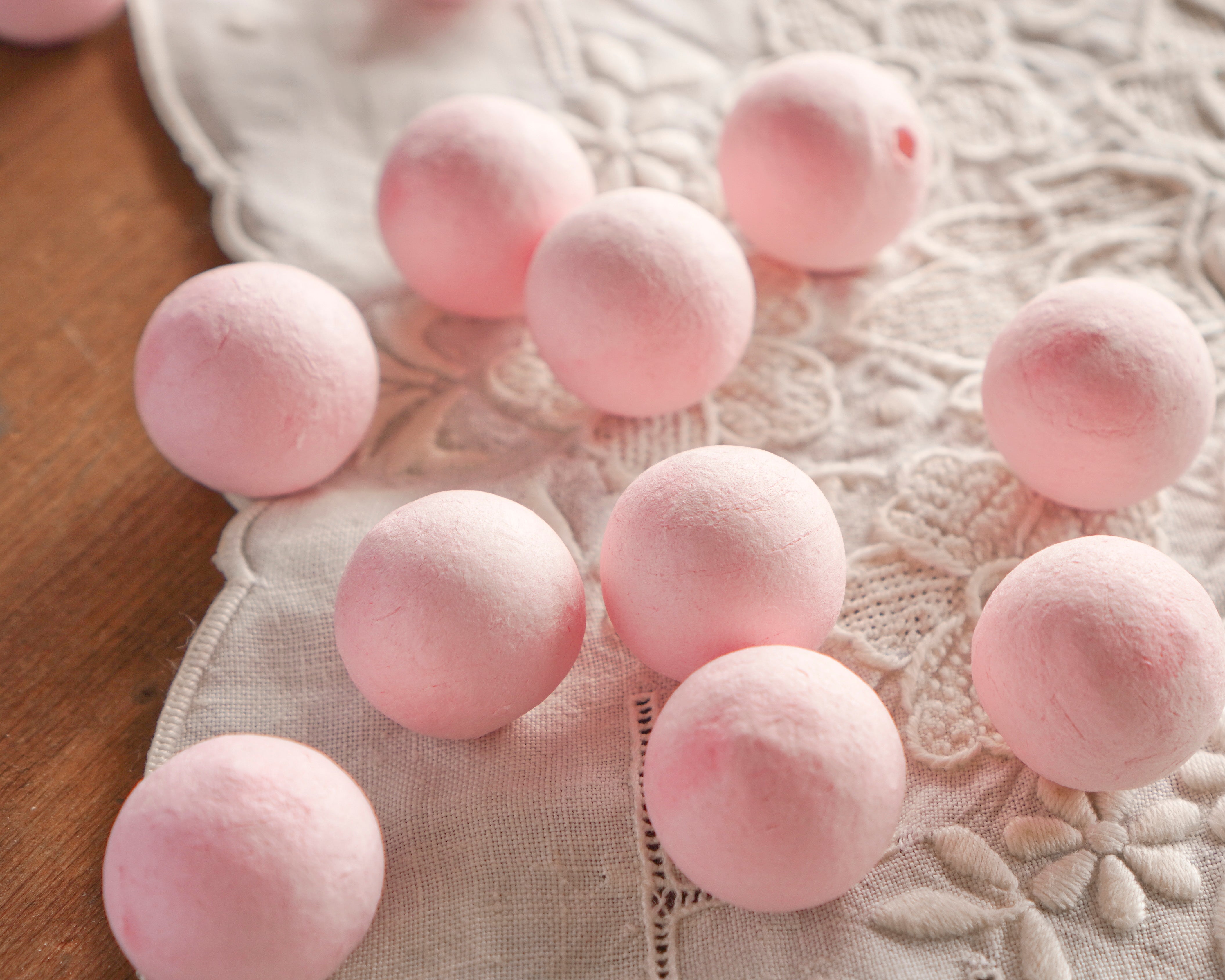 pink spun cotton doll heads