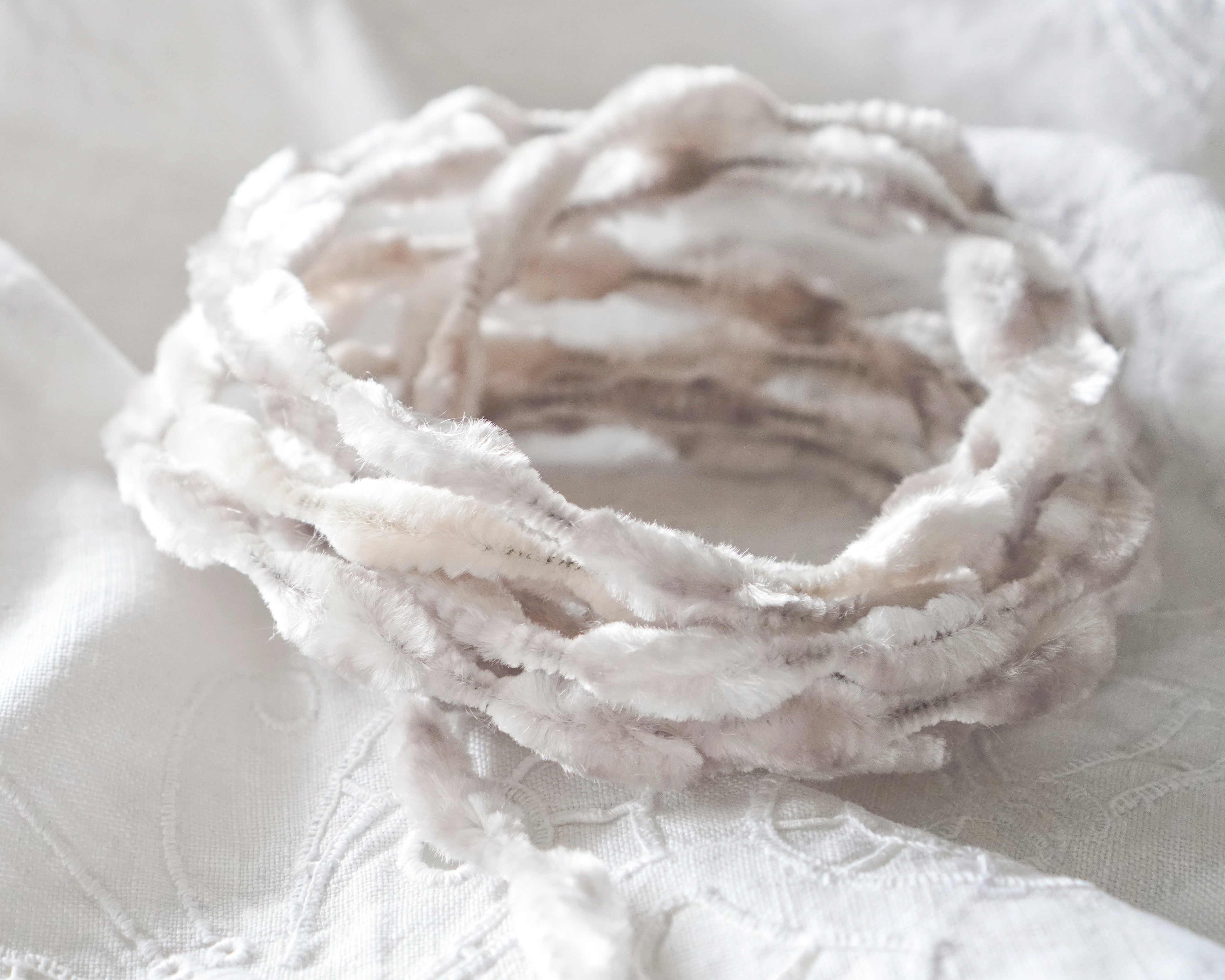 White textured bump chenille trim on a white background