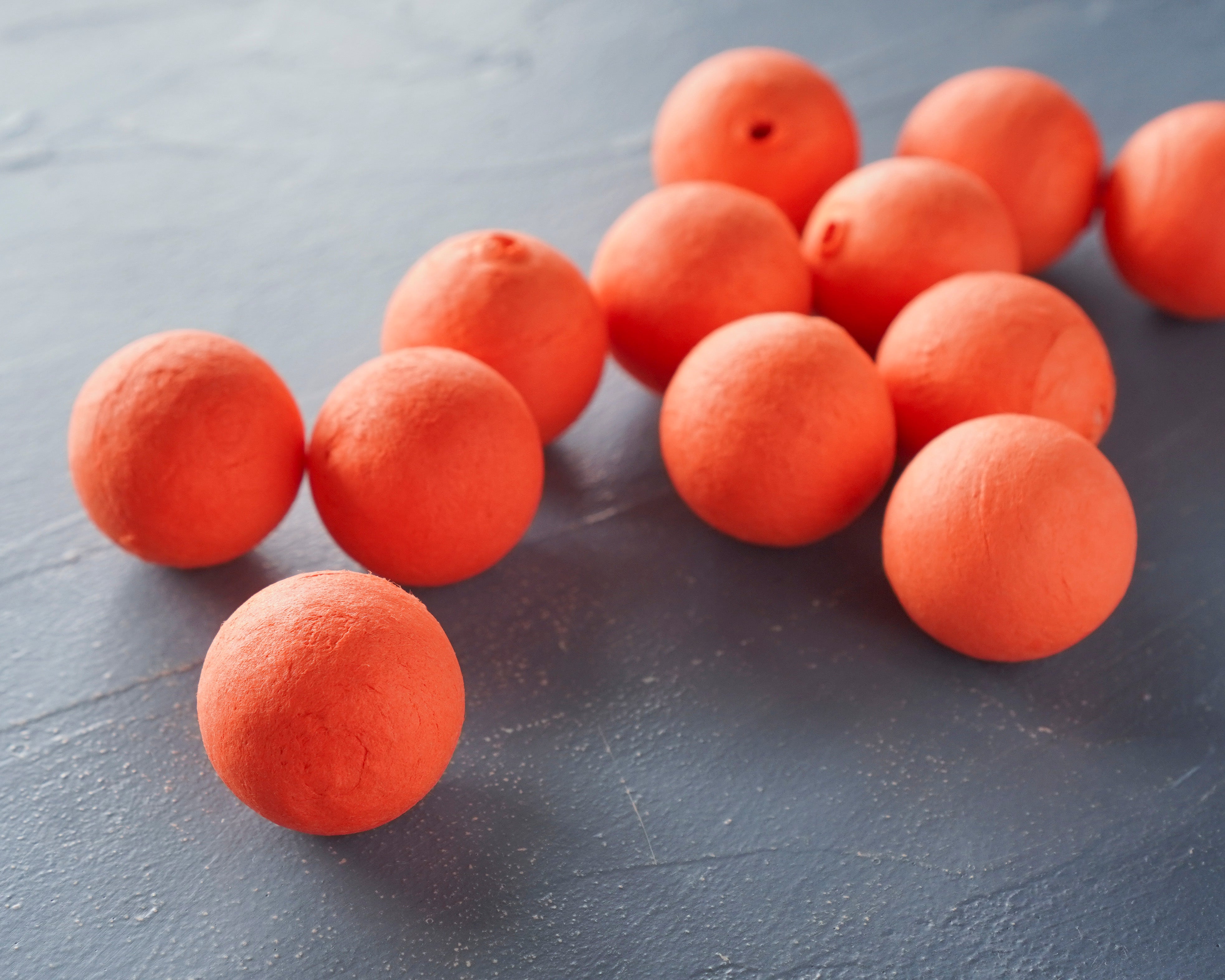 Elf Bodies - Orange Tinted 25mm Spun Cotton Balls, 12 Pcs.