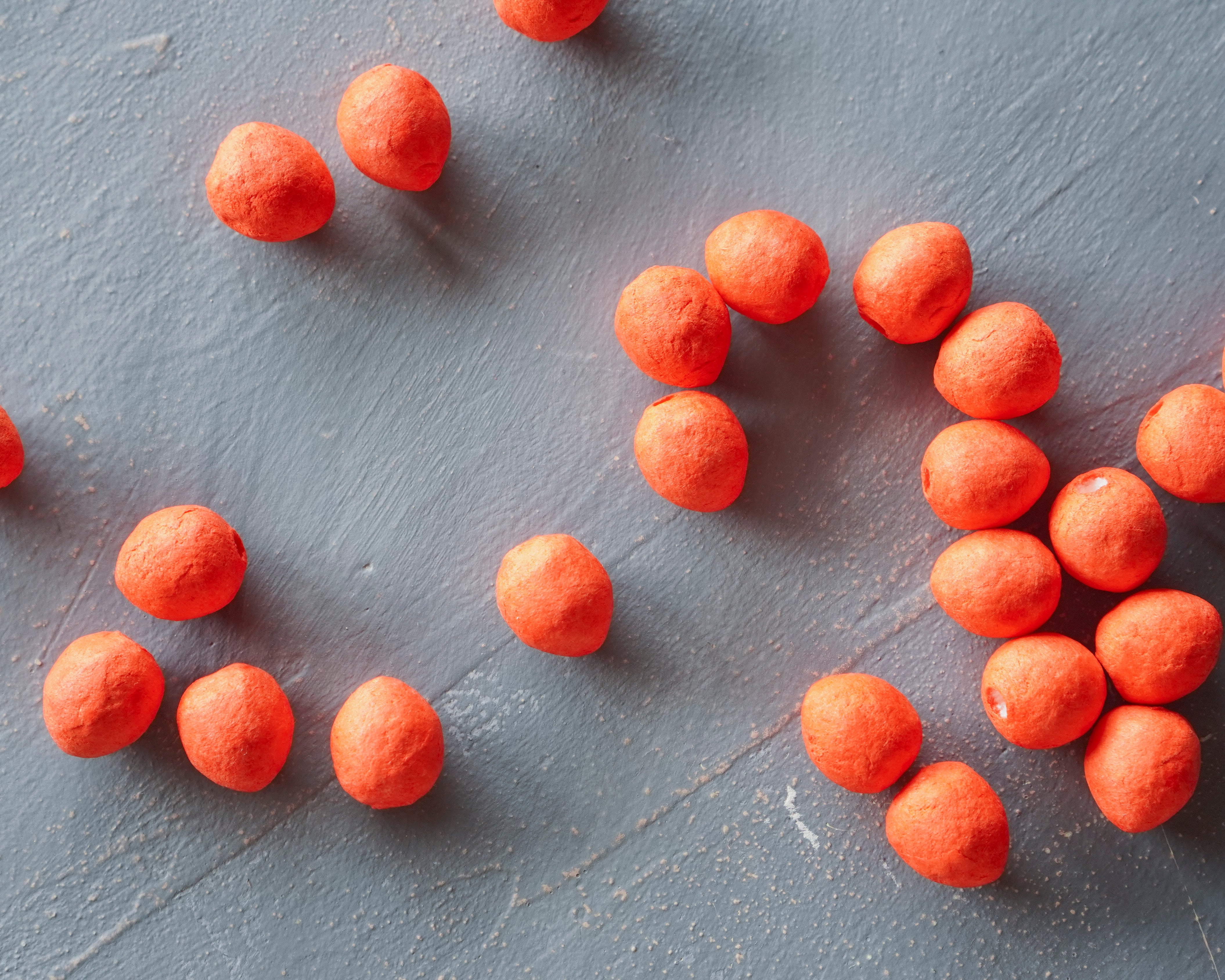 Elf Feet - Orange Tinted Spun Cotton Eggs 12x10mm, 24 Pcs.