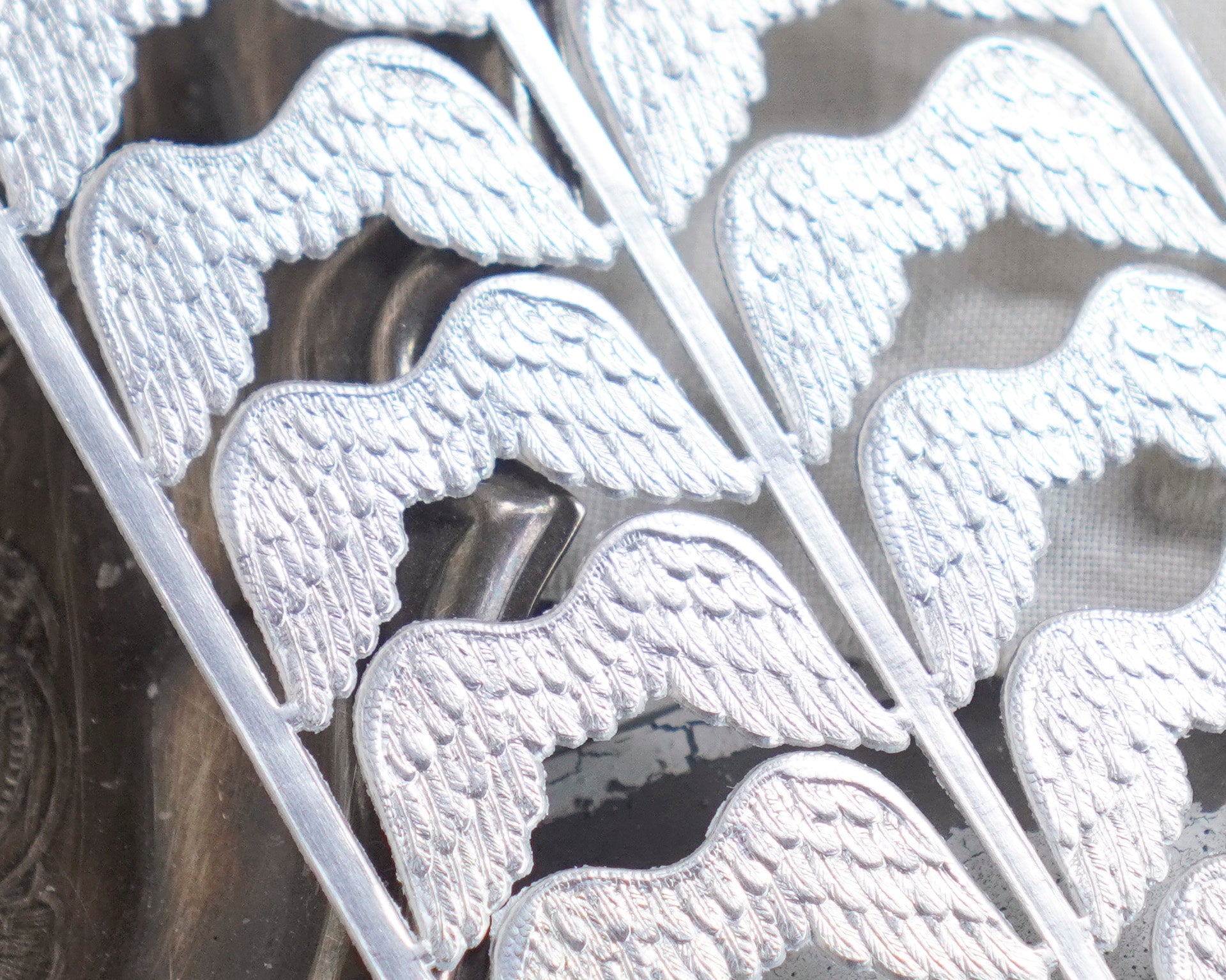 Mini Angel Wings - Tiny Embossed Silver Foil Die Cut Dresden Paper Wings, 12 Pcs.