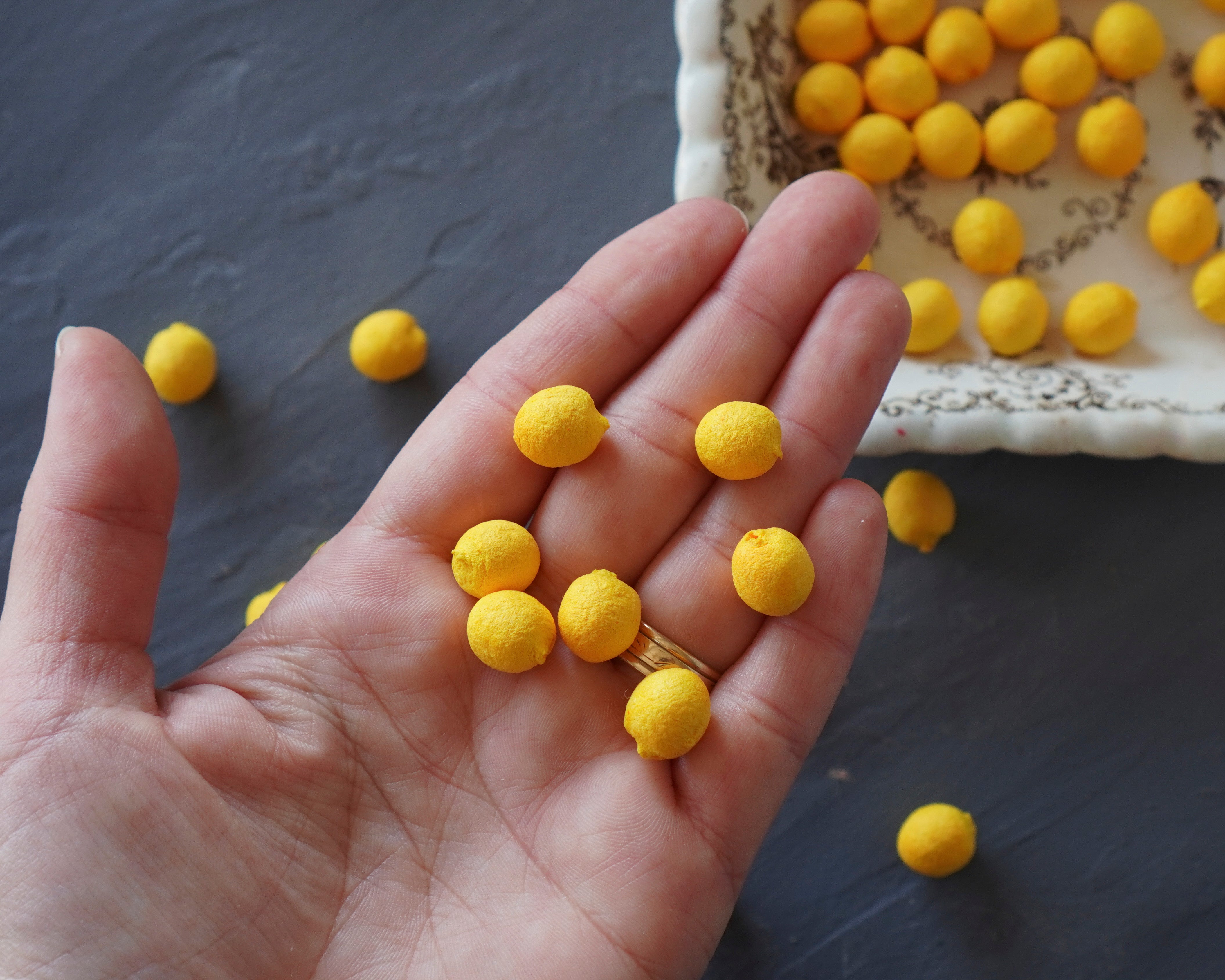 Elf Feet - Yellow Tinted Spun Cotton Eggs 12x10mm, 24 Pcs.