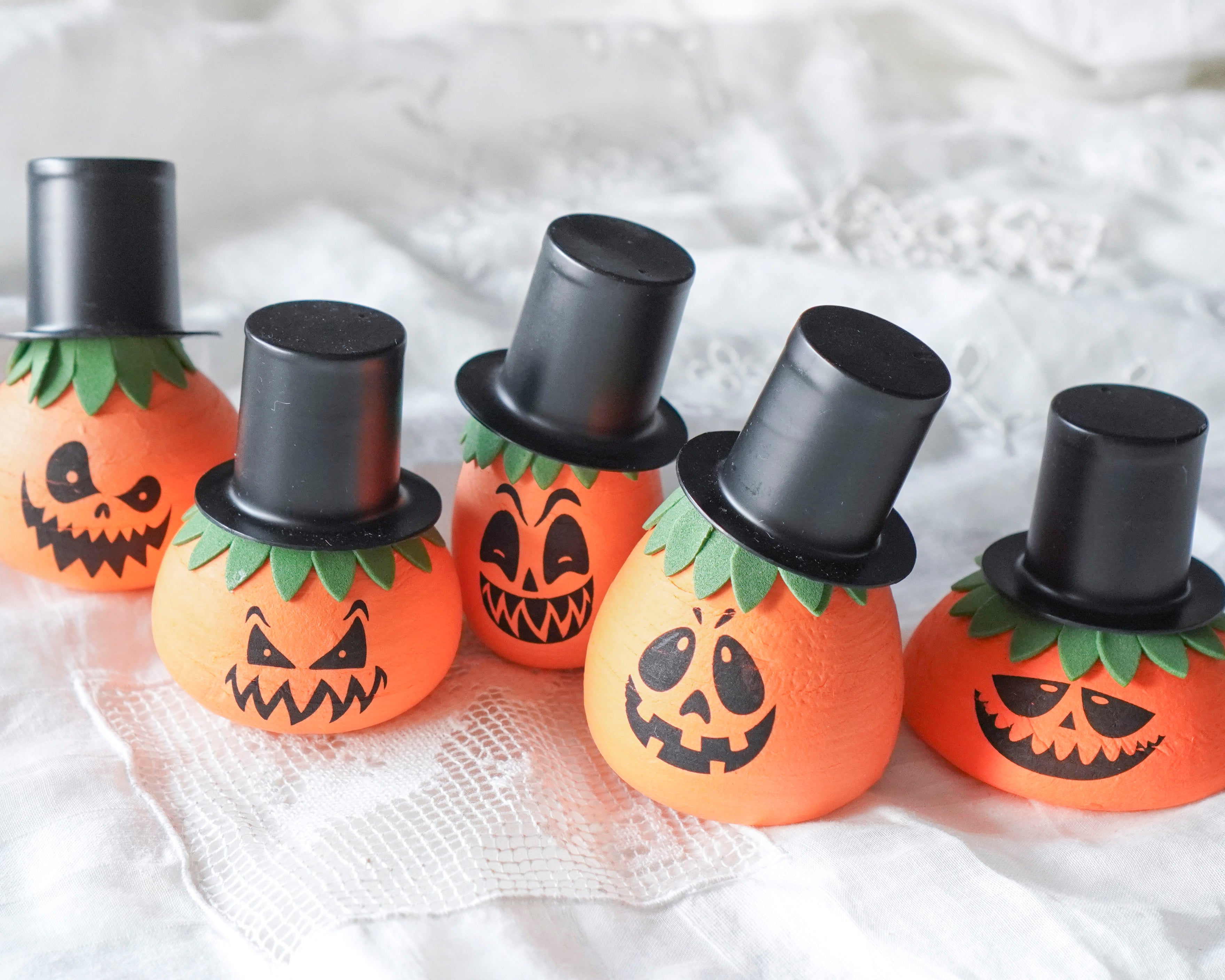 vintage halloween pumpkin heads arranged on a white background.