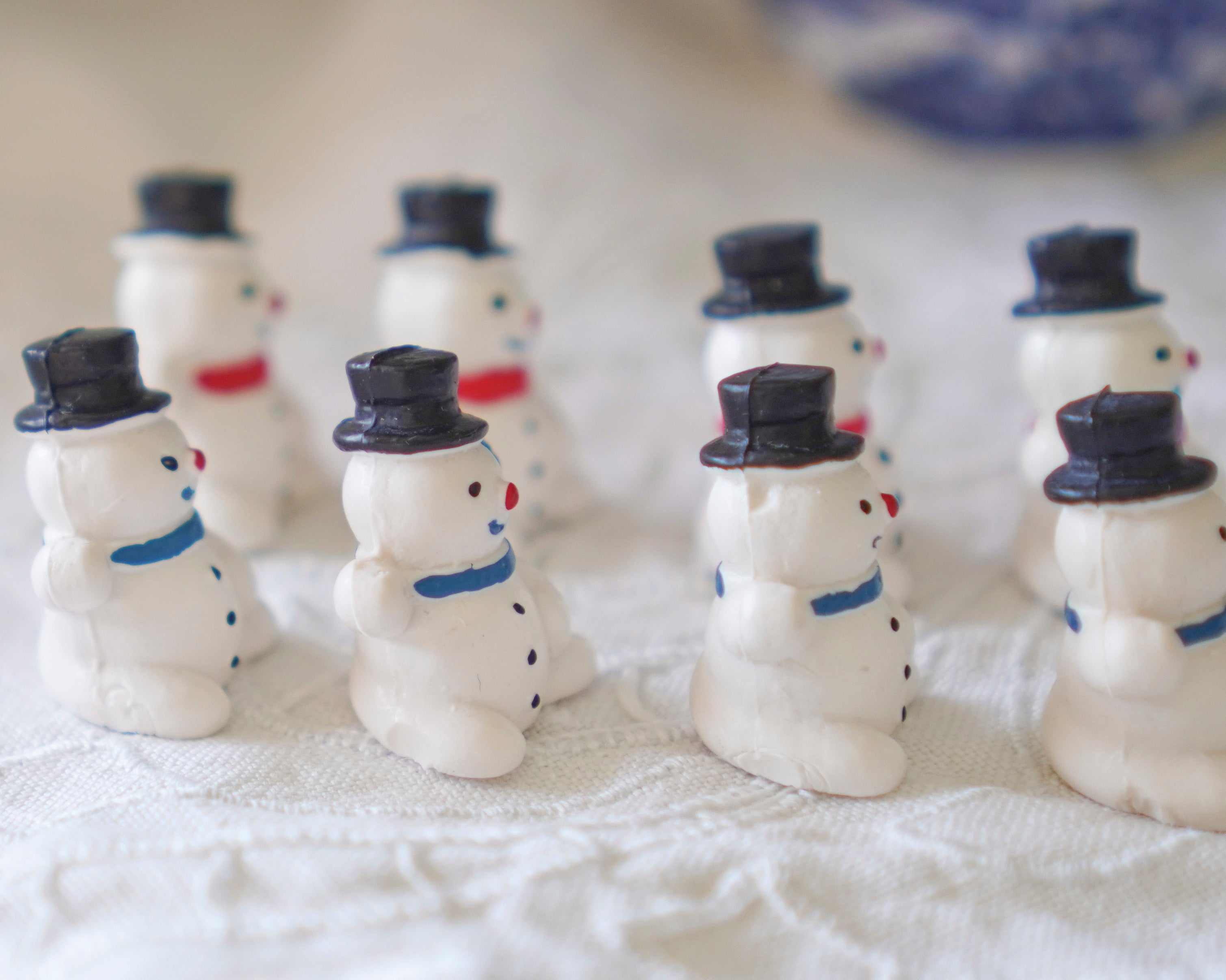 German Miniature Snowman Figurines with Red and Blue Scarves