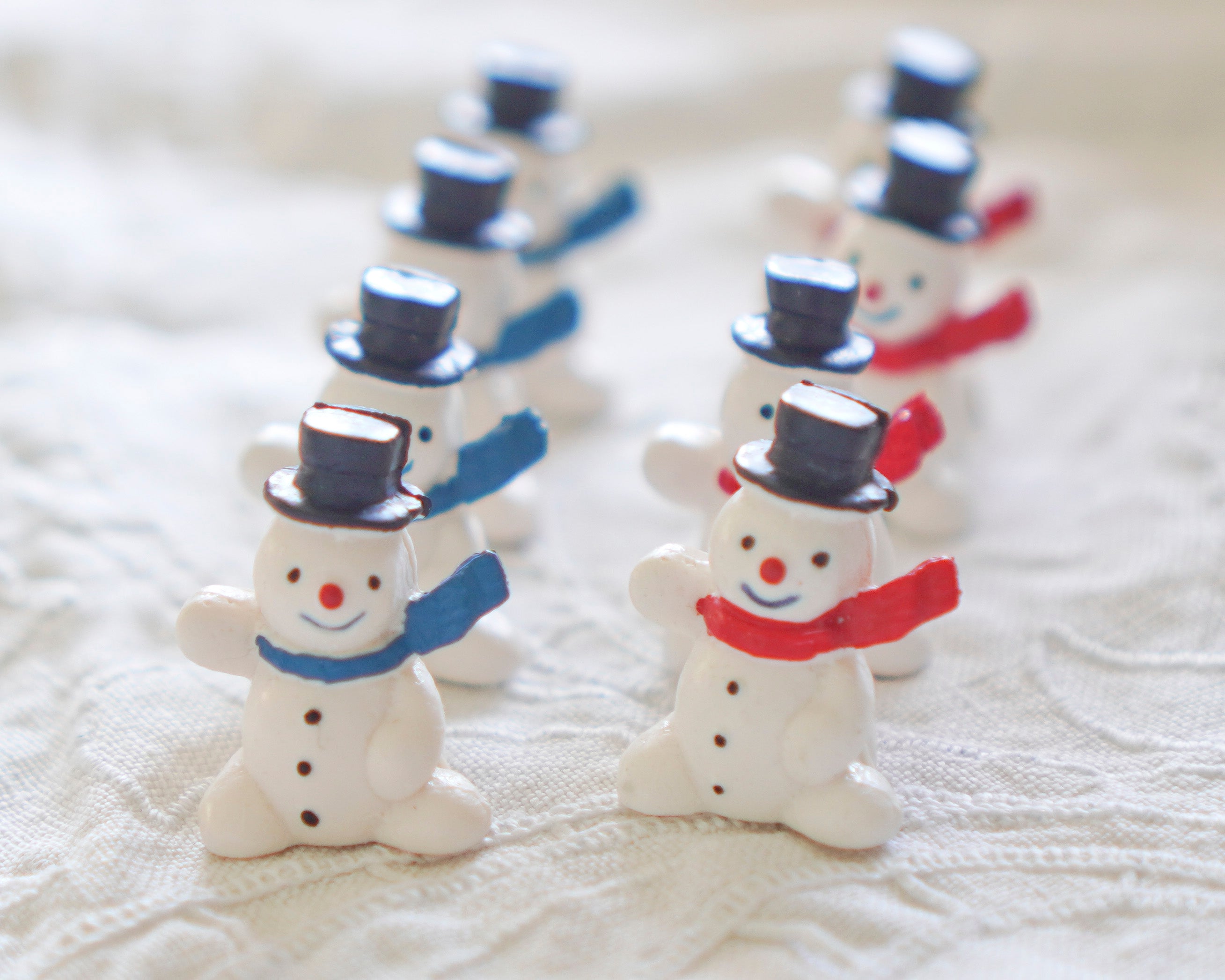 German Miniature Snowman Figurines with Red and Blue Scarves