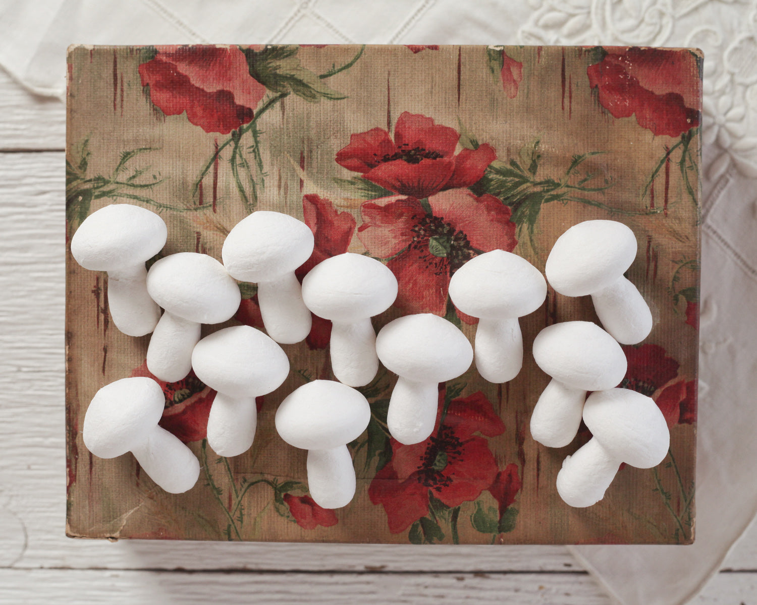 Unfinished spun cotton craft shapes to decorate.  These whimsical puffy mushrooms are made out of tightly spun cotton which can be painted, glittered, and embellished. They make great starters for vintage-style ornaments or decorations. Each mushroom has a small hole in the bottom of the stalk which can be used for mounting on wires or picks.