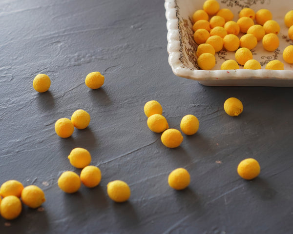Elf Feet - Yellow Tinted Spun Cotton Eggs 12x10mm, 24 Pcs.