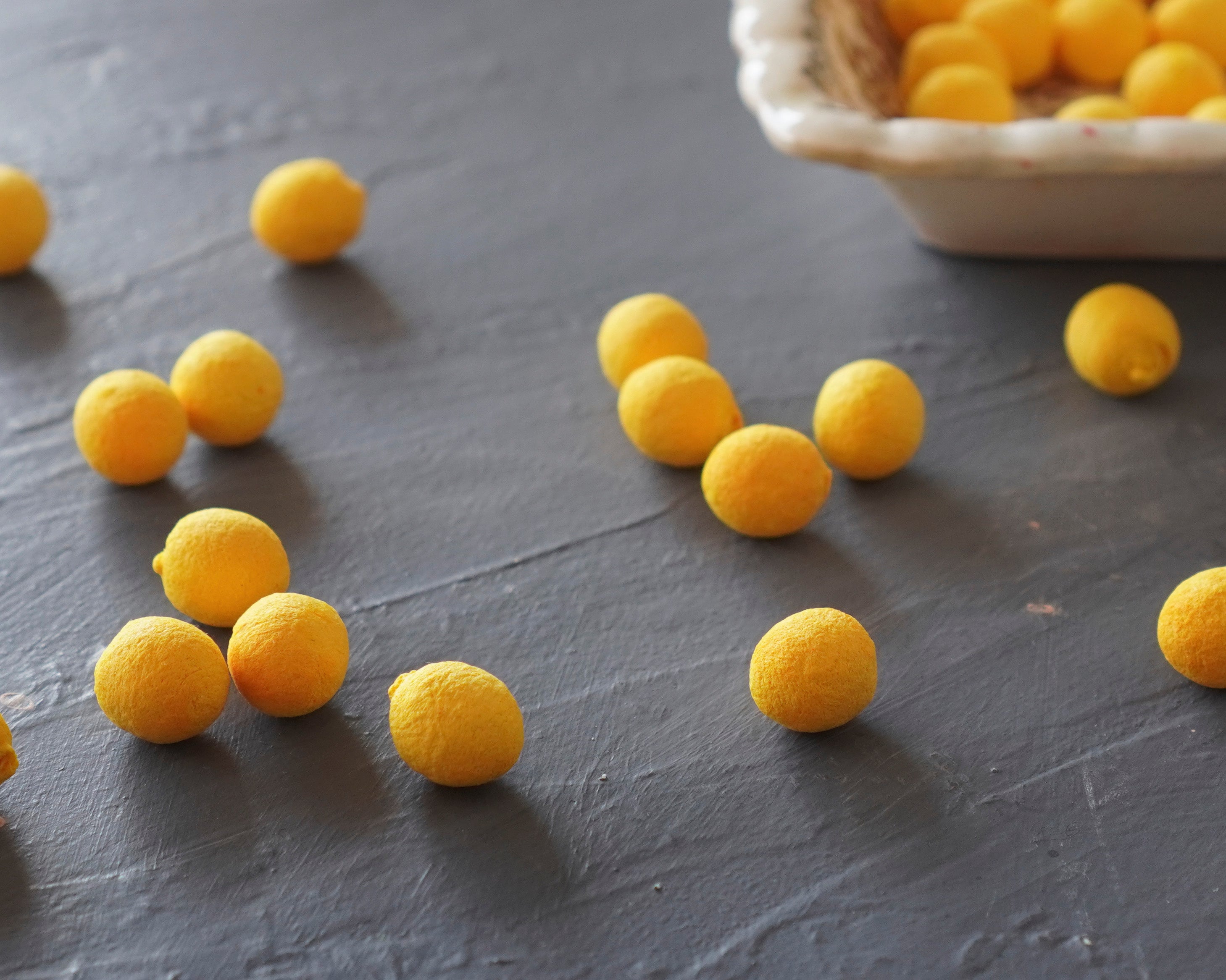 Elf Feet - Yellow Tinted Spun Cotton Eggs 12x10mm, 24 Pcs.